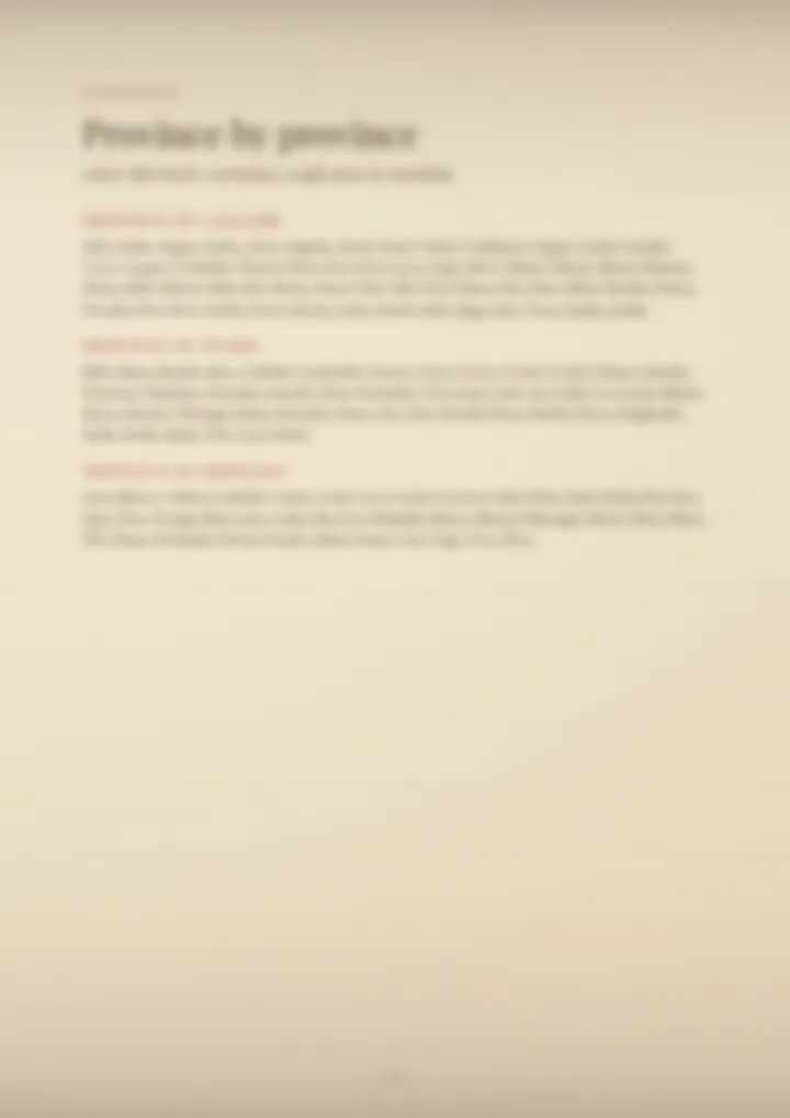 A blurred page from the volume Surnames of Sardinia