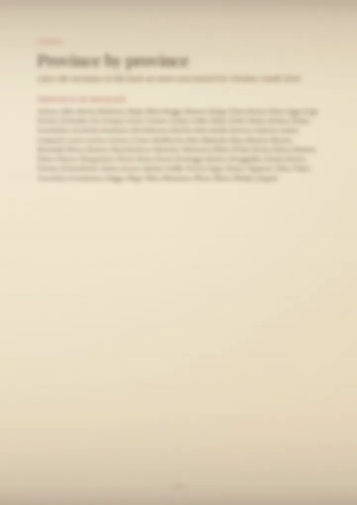 A blurred page from the volume Surnames of Trentino-Alto Adige